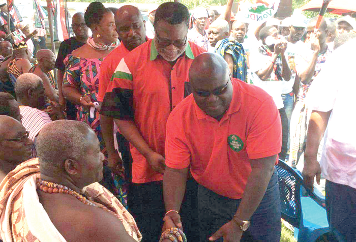 Mr Julius Debrah in a handshake with Togbe Ayim Modey VI, the acting President of Peki Traditional Council